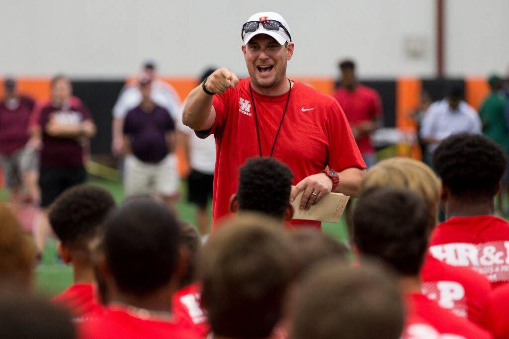 University of Houston football head coach Tom Herman make an announcement to the high school...