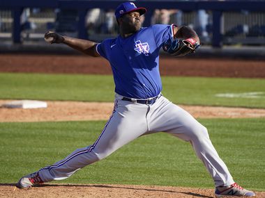 Texas Rangers pitcher Demarcus Evans pitches during the ninth inning of a spring training game against the Seattle Mariners at Peoria Sports Complex on Sunday, Feb. 23, 2020, in Peoria, Ariz. 