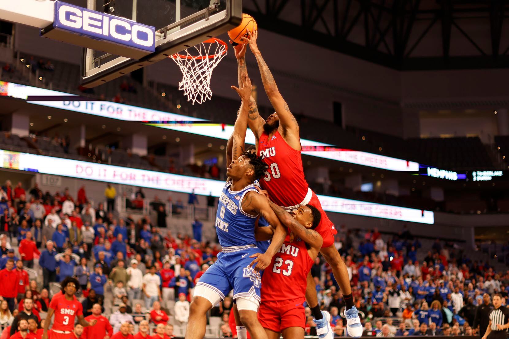 SMU forward Marcus Weathers (50) dunks the ball in front of Memphis guard Earl Timberlake...