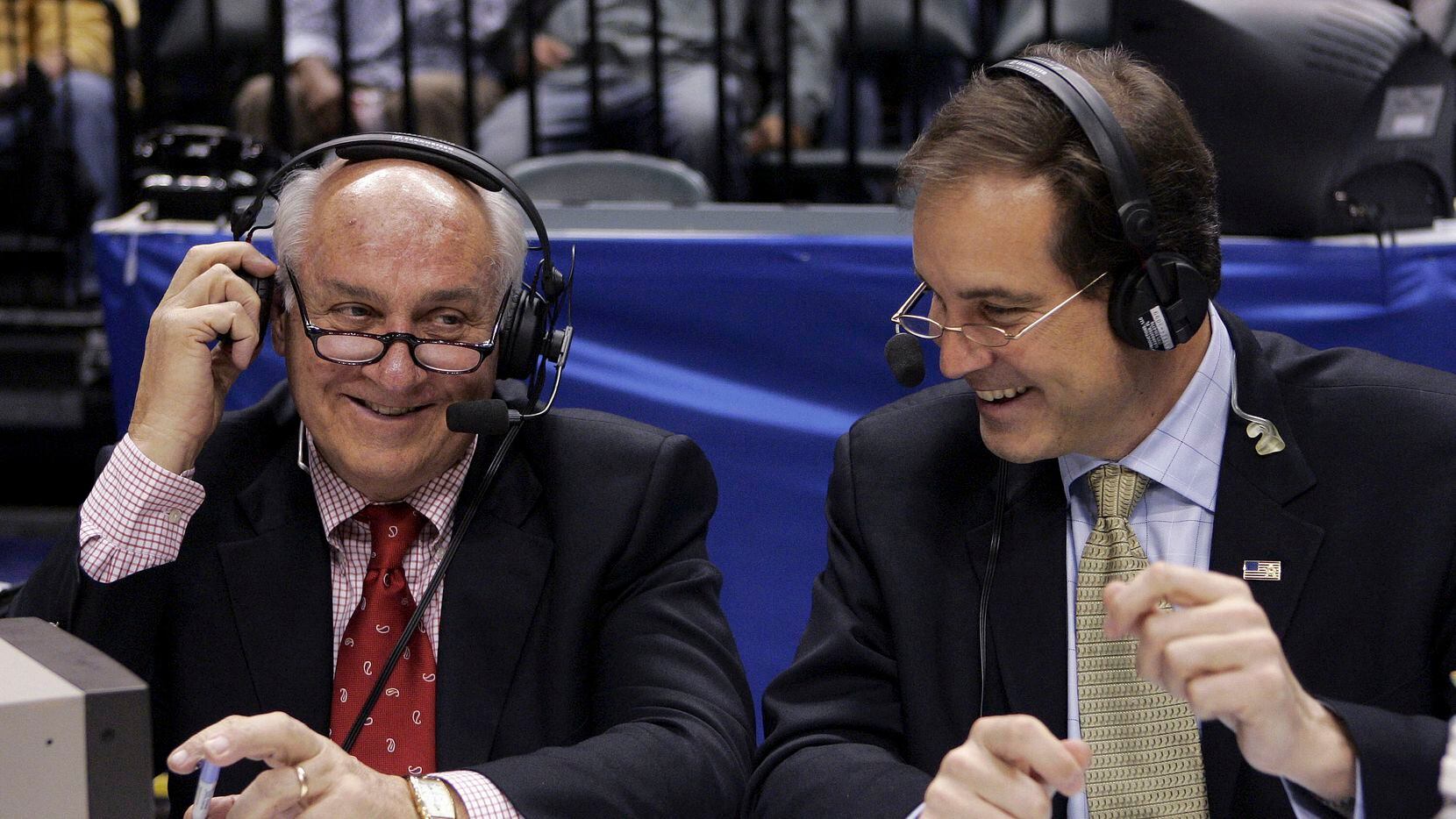 FILE - CBS announcers Billy Packer, left, and Jim Nantz laugh during a break in the...