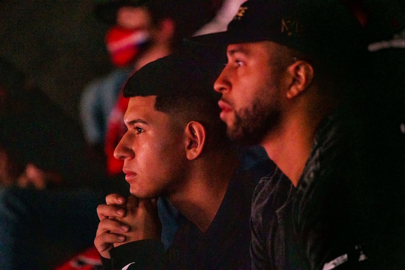 From left, Anthony “Shotzzy” Cuevas-Castro brothers Steven Quevedo, Gabriel Castro, and his mother Christina Hernandez  watch Shotzzy compete during the winners final of the Call of Duty league playoffs at the Galen Center on Saturday, August 21, 2021 in Los Angeles, California. The Empire lost to FaZe 0 - 3 in their first match of the day but are still in contention to play in the finals through the elimination finals. (Justin L. Stewart/Special Contributor)