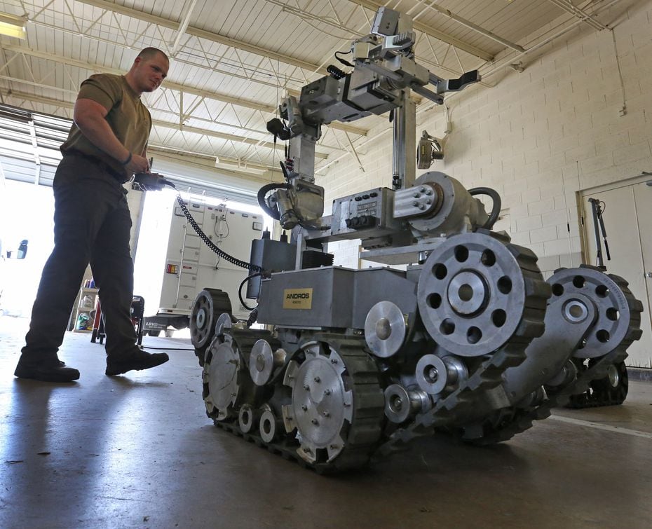 Garland Police Officer Robby Shreves operates the department's bomb robot on Tuesday, May...