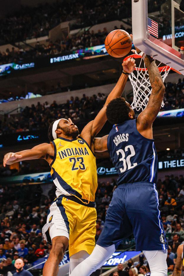 Dallas Mavericks forward Marquese Chriss (32) goes for a shot as Indiana Pacers forward Isaiah Jackson (23) tries to block him during the second half at the American Airlines Center in Dallas on Saturday, January 29, 2022.