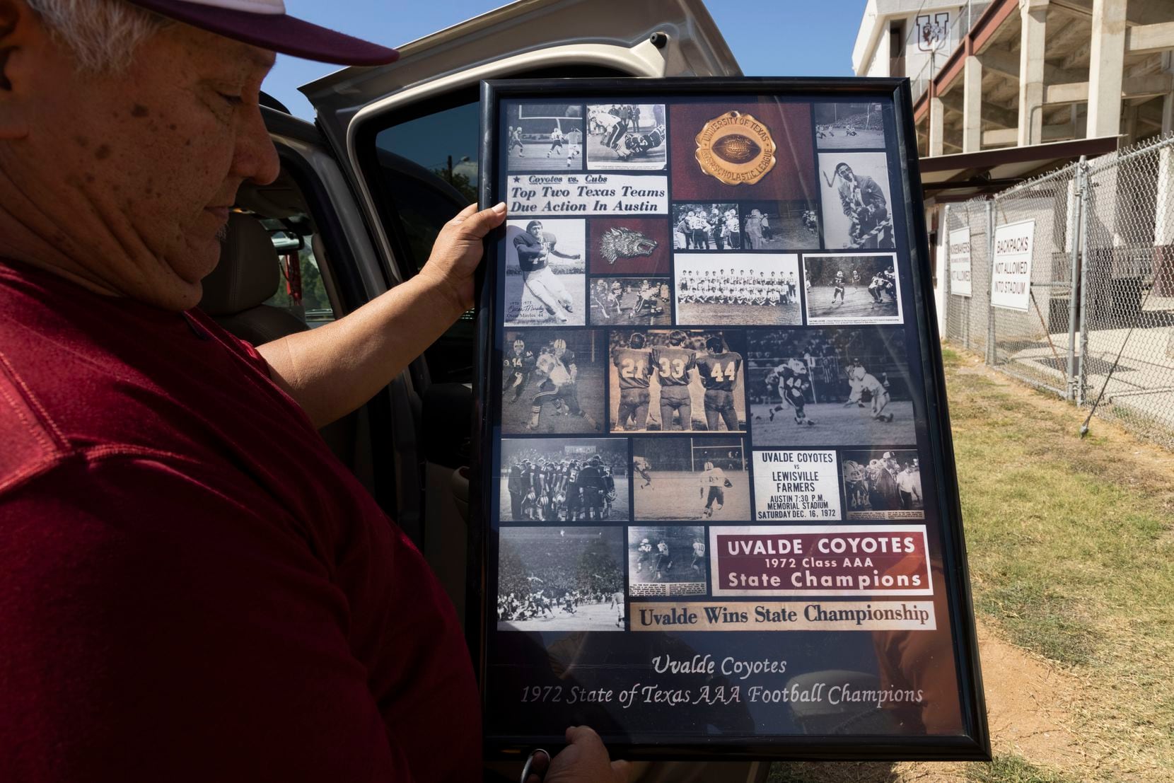 Former Uvalde football state champion Oscar Mireles shows a collage remembering his time as...