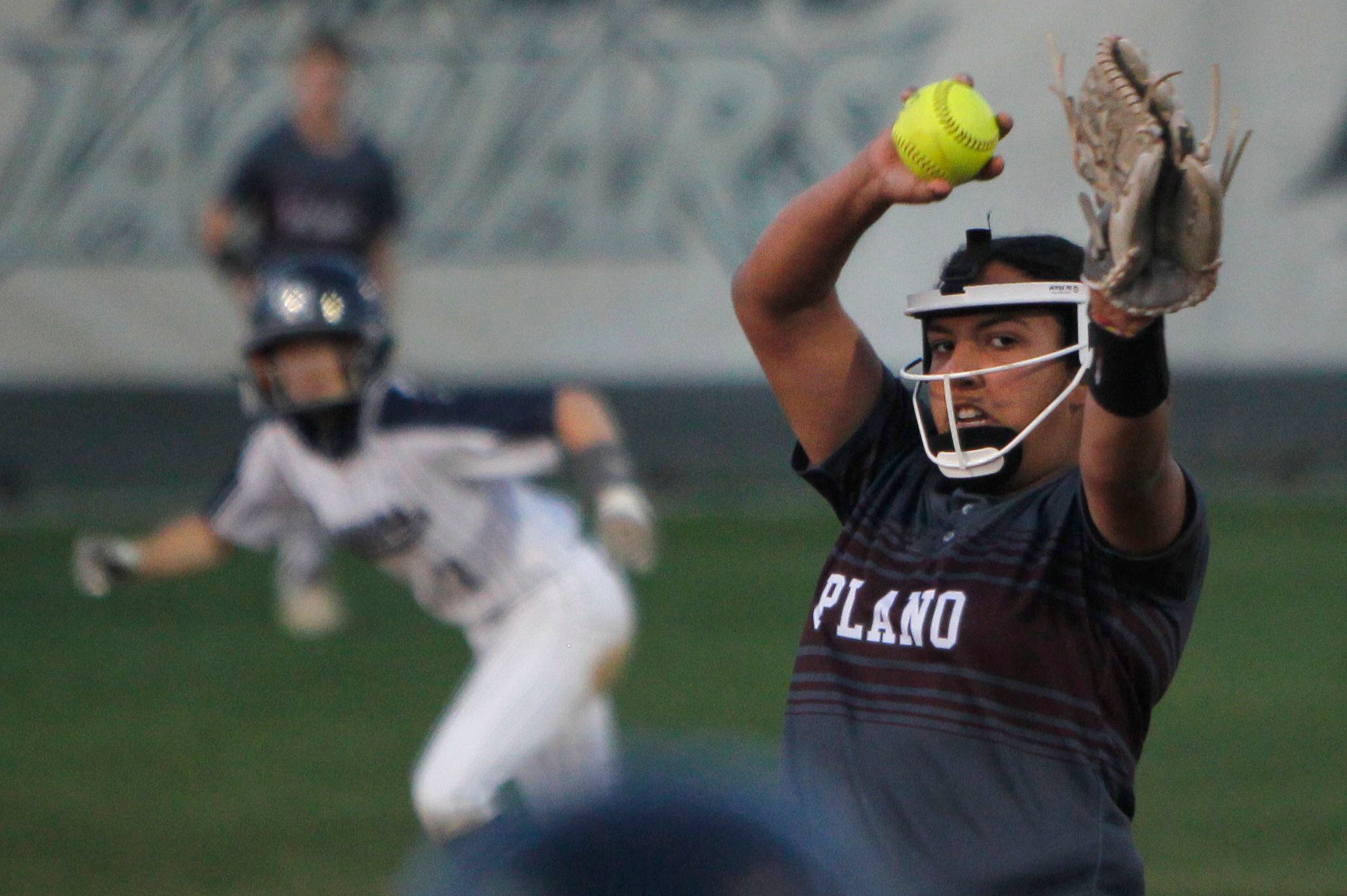 Plano pitcher Jayden Bluitt (20) delivers a pitch to a Plano batter during the bottom of the...