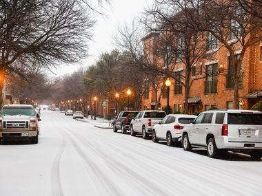 Sleet falls over State St and N Hall St on Tuesday, Jan. 31, 2023. Weather conditions are...