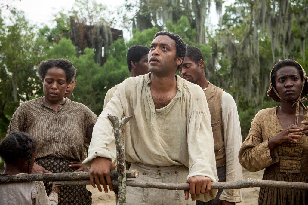 Chiwetel Ejiofor, center, in a scene from "12 Years A Slave."