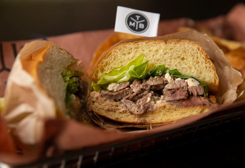You can get the signature grilled steak sandwich at the Meat Board in Fort Worth.