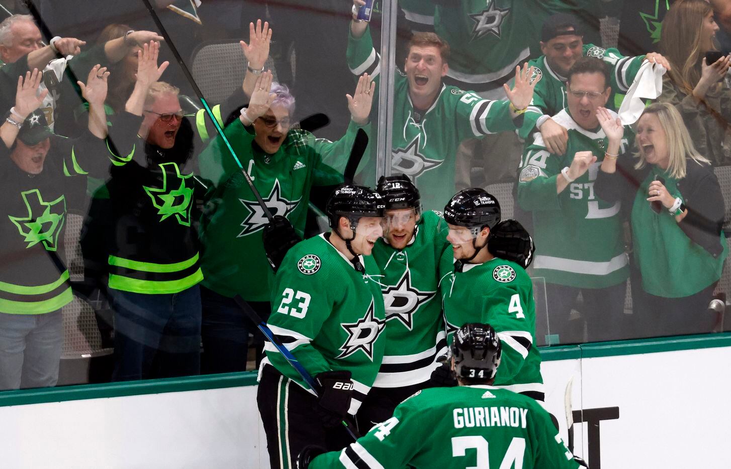 Fans congratulate Dallas Stars center Radek Faksa (12) on his first period goal in Game 3 of...