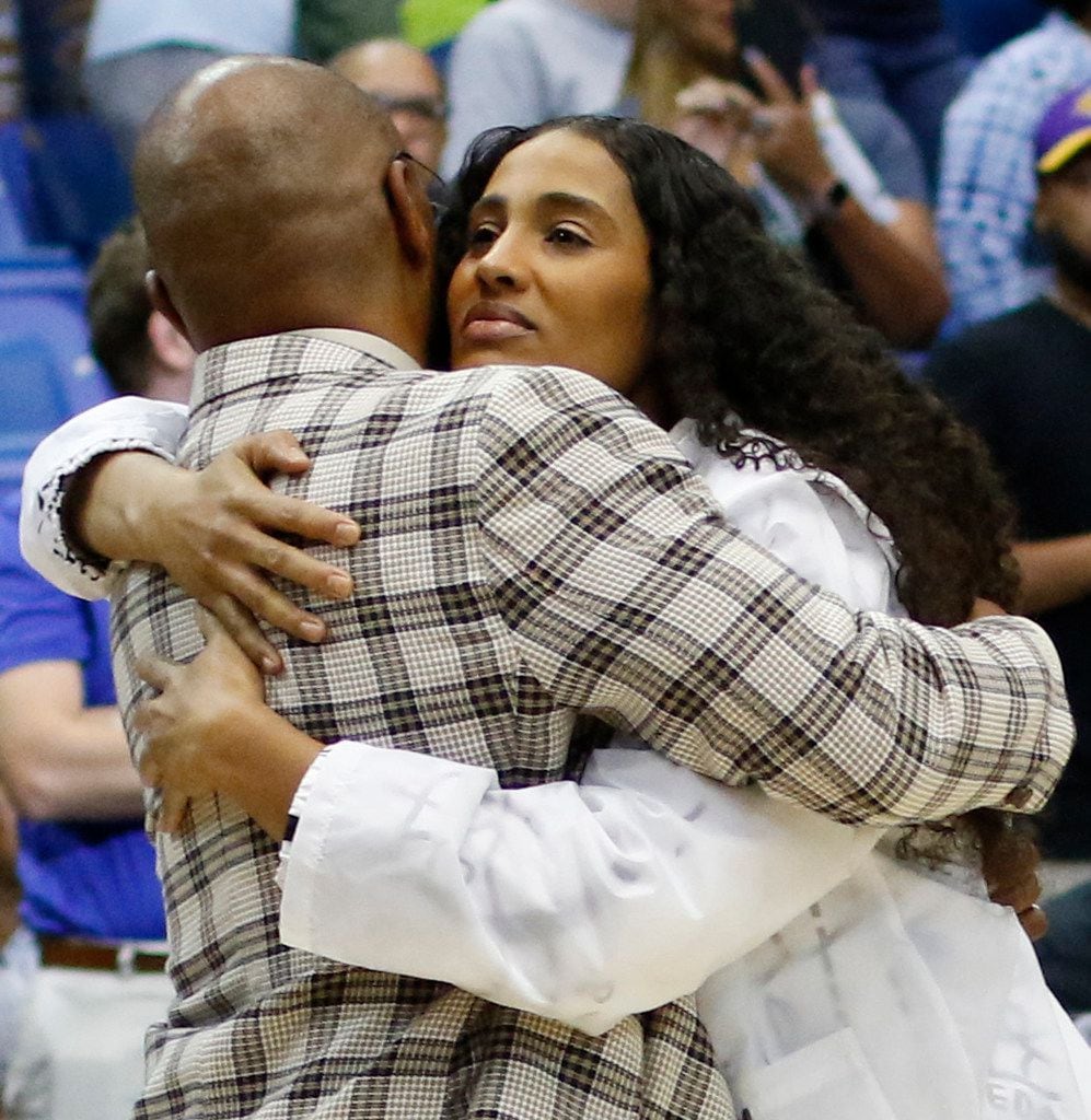 Dallas Wings guard Skylar Diggins-Smith shares a hug with former Wings head coach Fred...