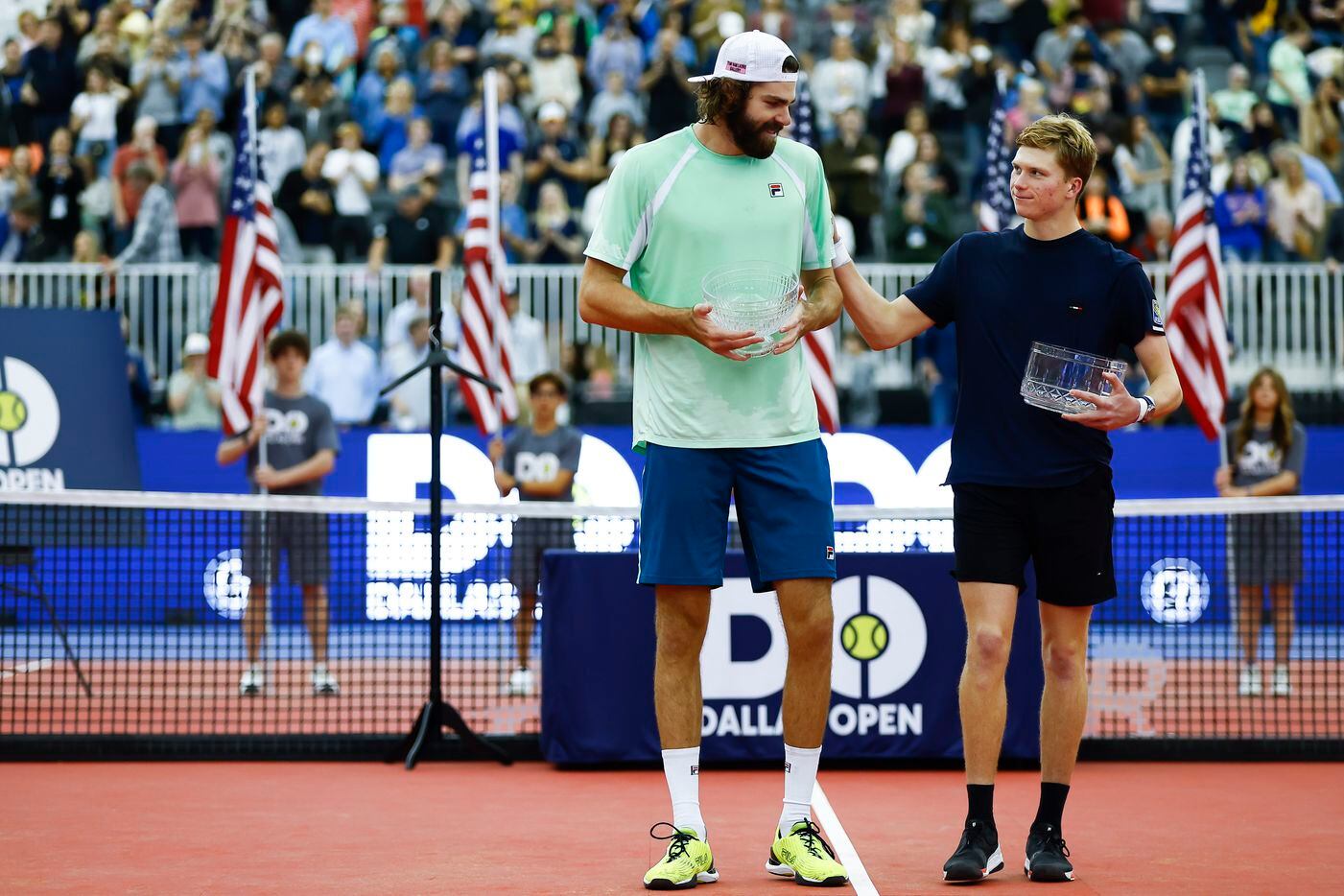 Jenson Brooksby, right, congratulates Reilly Opelka after the finals ATP Dallas Open at The...