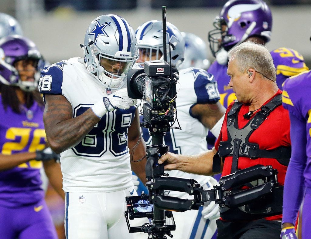 Dallas Cowboys wide receiver Dez Bryant (88)  plays to the camera after scoring his fourth...