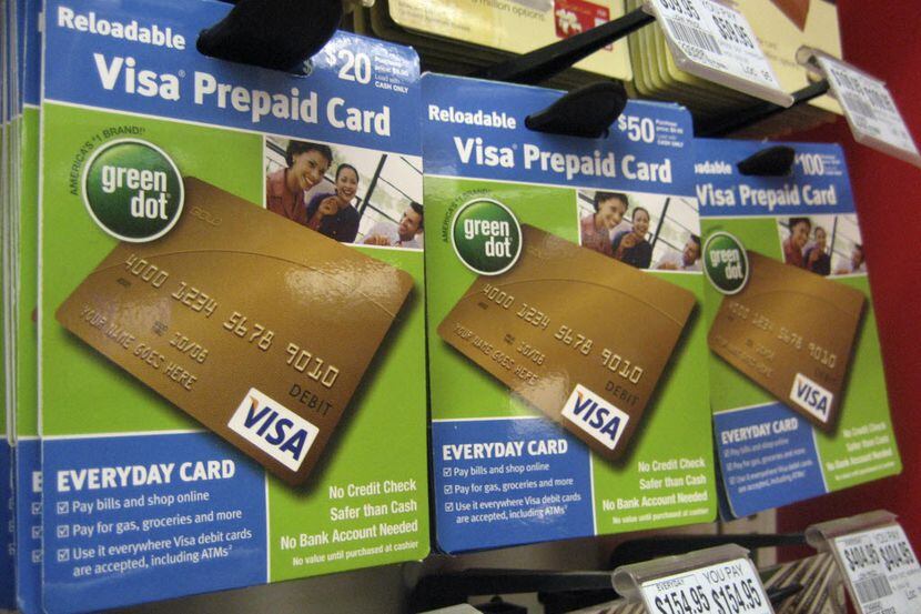 FILE - This Feb. 15, 2010 file photo shows Visa prepaid cards at a Duane Reade drug store in...