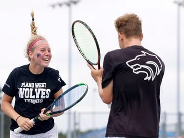 Plano West’s Summer Shannon (left) and Dmitri Goubin celebrate after winning the 6A mixed...