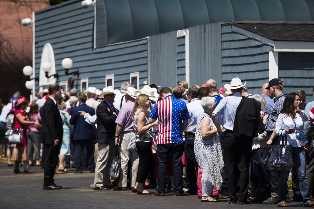 Supporters wait in line for the doors to open for a Ted Cruz "thank you" event on the third...