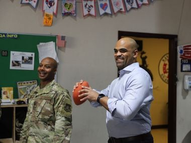 Rep. Colin Allred, D-Dallas, throws a football at Camp Arifjan in Kuwait. Allred visited the base as part of a weeklong trip to visit soldiers in Kuwait and Afghanistan late last year.