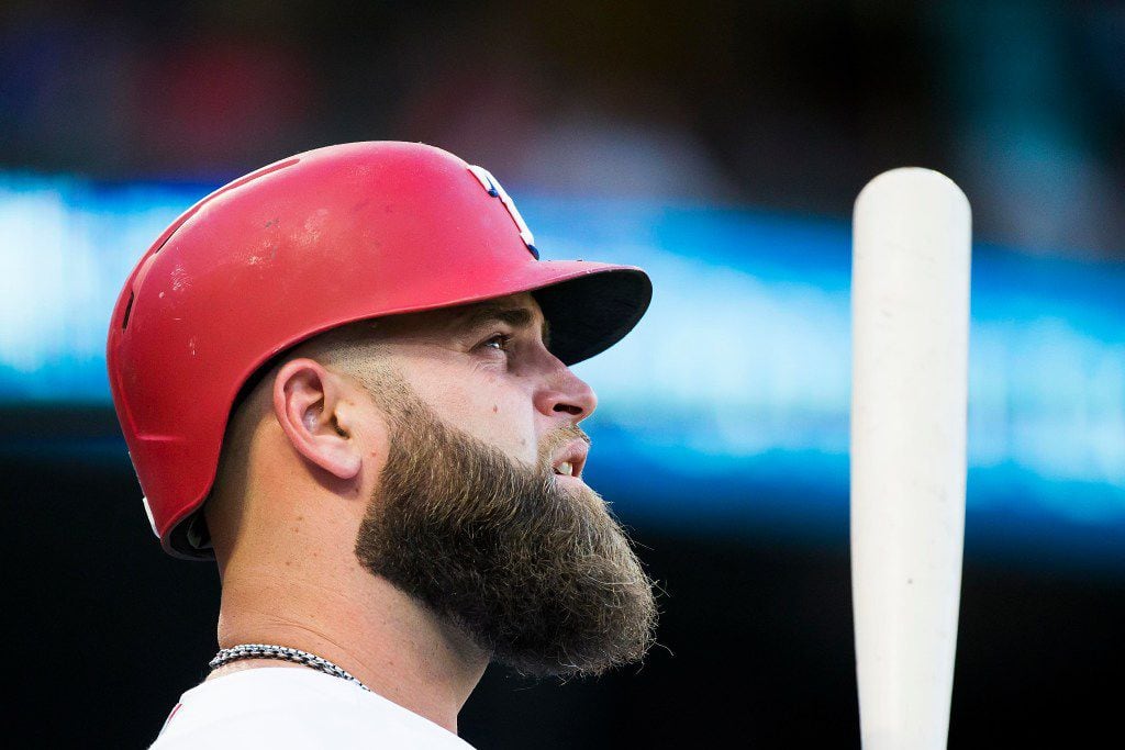 Texas Rangers first baseman Mike Napoli waits in the on deck circle during the first inning...