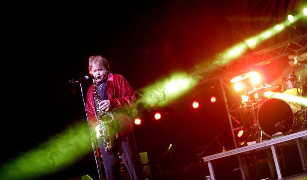 In this April 2, 2016 file photo, Eddie Money performs at GlenOak High School in Canton, Ohio.   Family members have said Eddie Money has died on Friday, Sept. 13, 2019. (Bob Rossiter/The Repository via AP)
