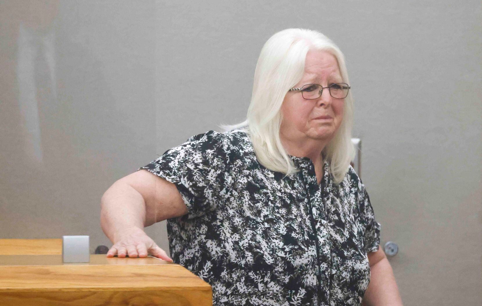 Debbie Young, the mother of murder victim David Young, becomes emotional as she leaves the...