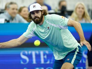 Reilly Opelka returns the ball during the finals ATP Dallas Open against Jenson Brooksby at...