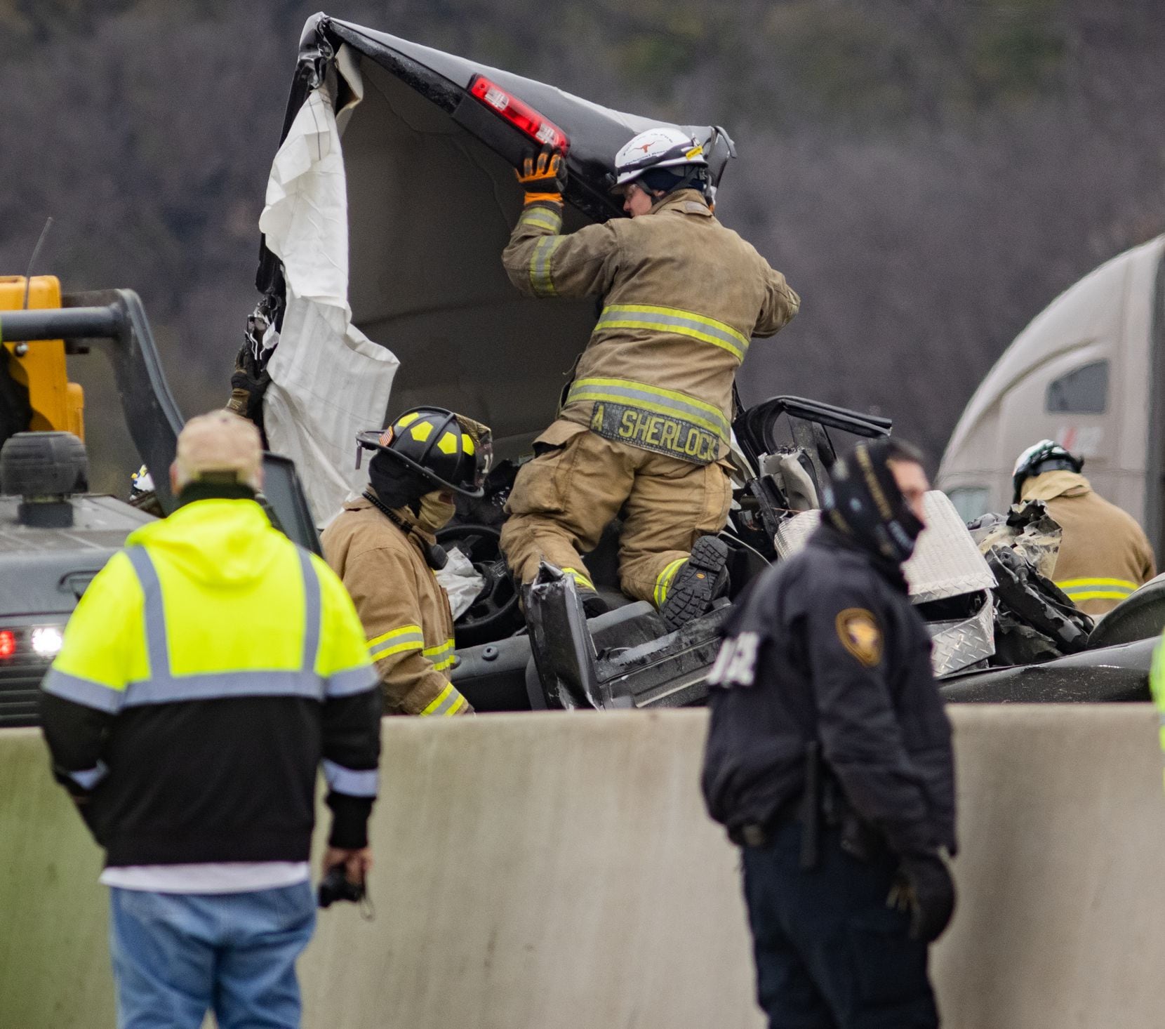 Emergency crews work to clear the mass casualty pile-up on I-35W and Northside Drive in Fort Worth on  Feb. 11.