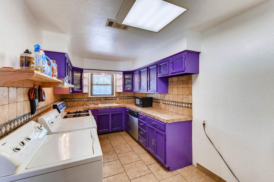 The kitchen at 2557 Glenfield Avenue in Dallas is very purple.