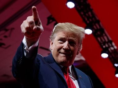 President Donald Trump points to the cheering audience as he arrives to speak at the annual Conservative Political Action Conference, CPAC 2019, in Oxon Hill, Md.,on  March 2, 2019.