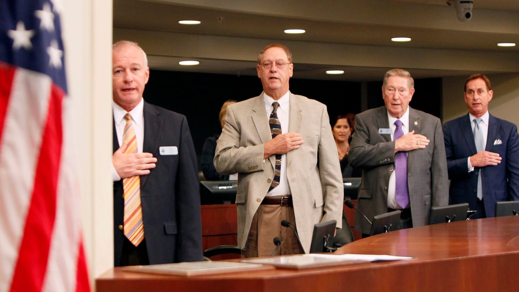 Farmers Branch Mayor Bob Phelps, third from left, stands with other council members during...