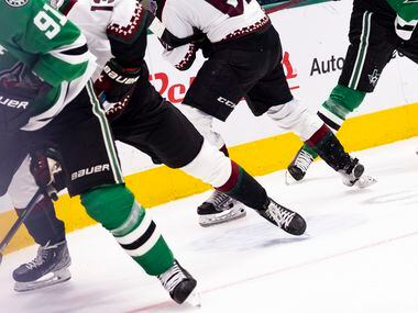 The Dallas Stars play against the Arizona Coyotes during the first period of a game, on...