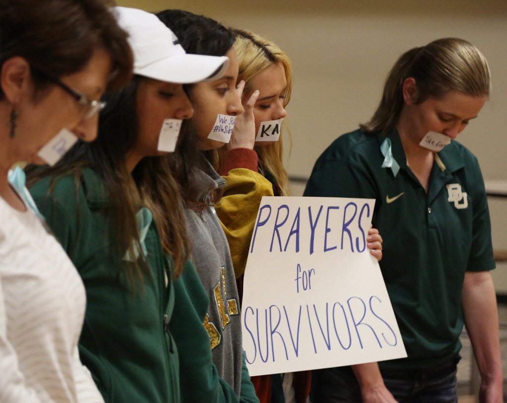 Current and former Baylor students hold a rally warning of sexually assaults on and off...