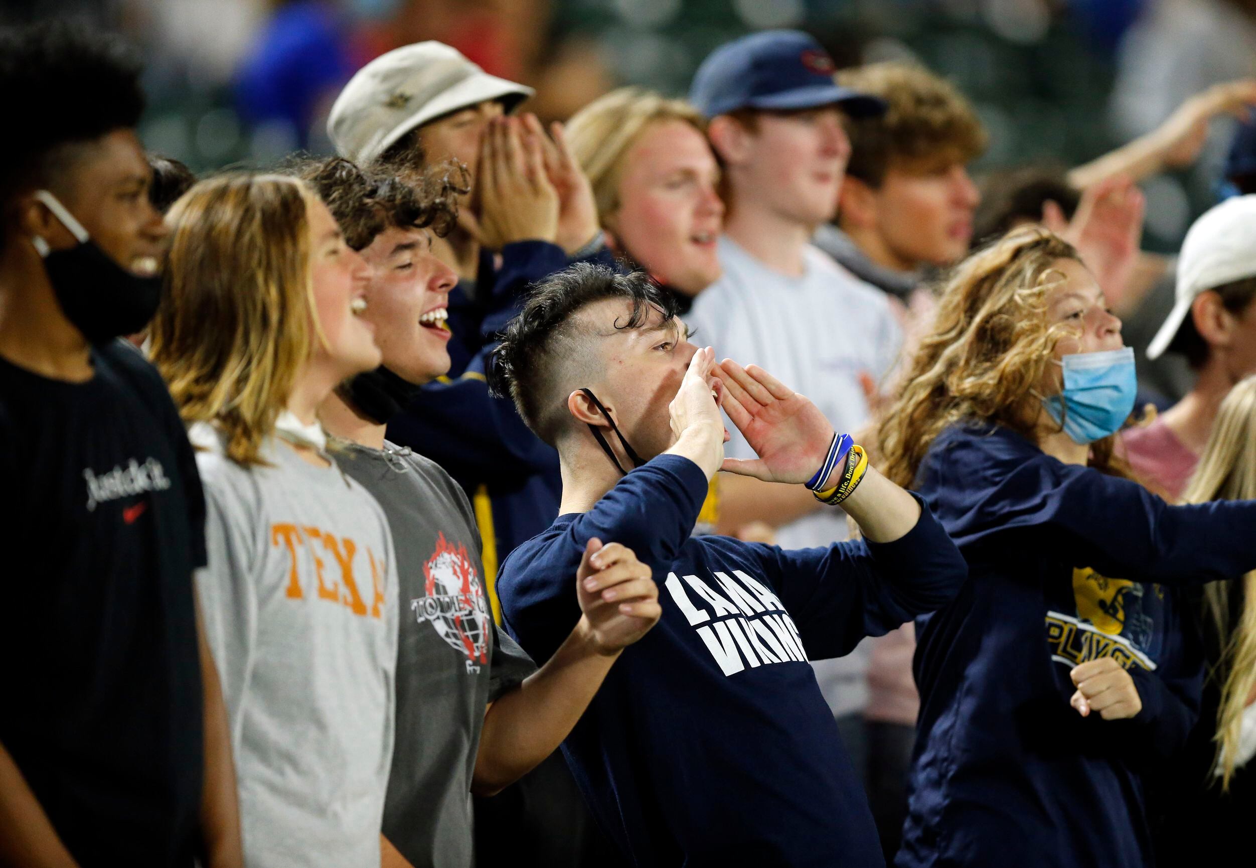 Arlington Lamar students cheer on their team as they attempt to comeback against Euless...