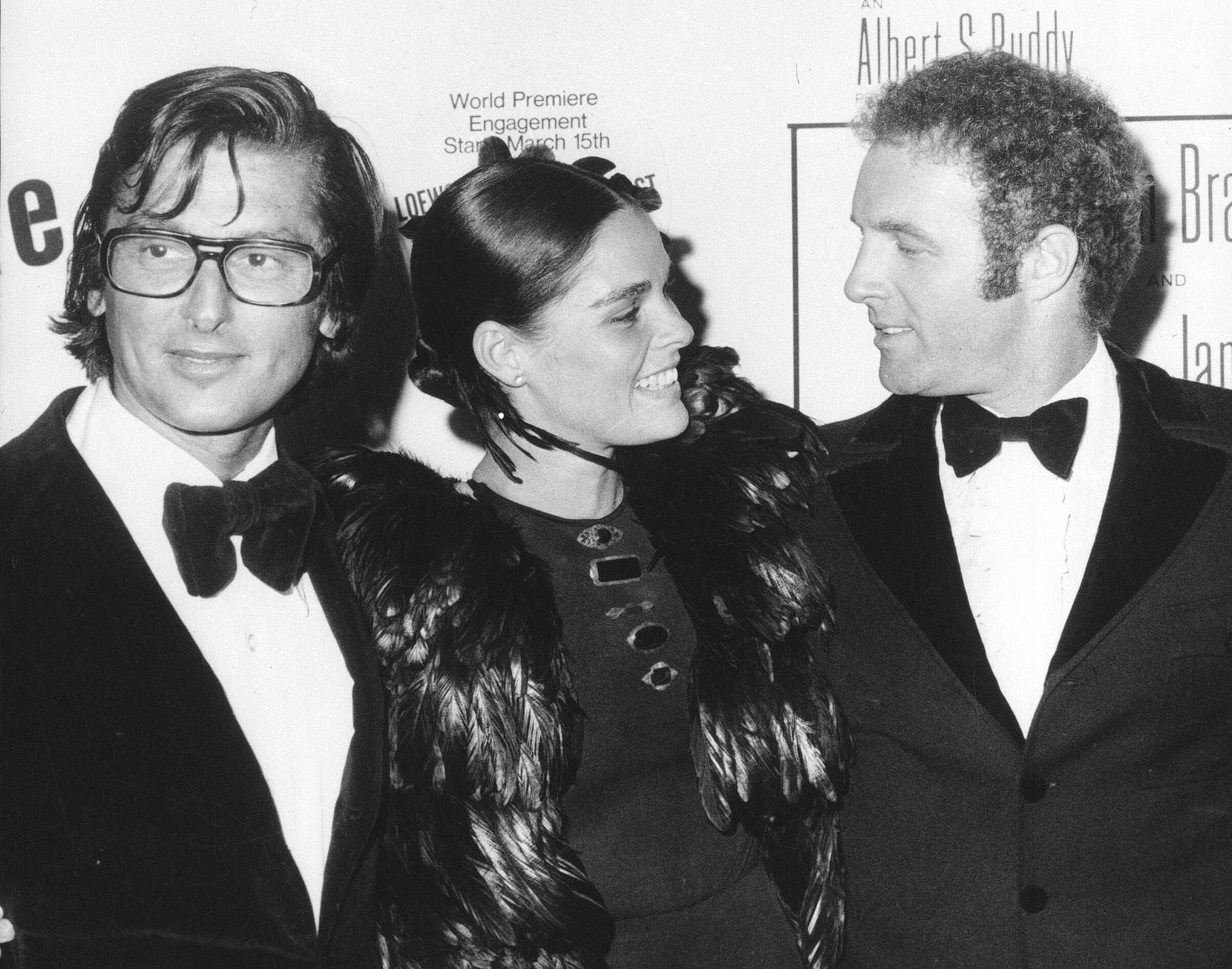 FILE - Paramount Pictures vice president Robert Evans, left, his wife, actress Ali MacGraw,...