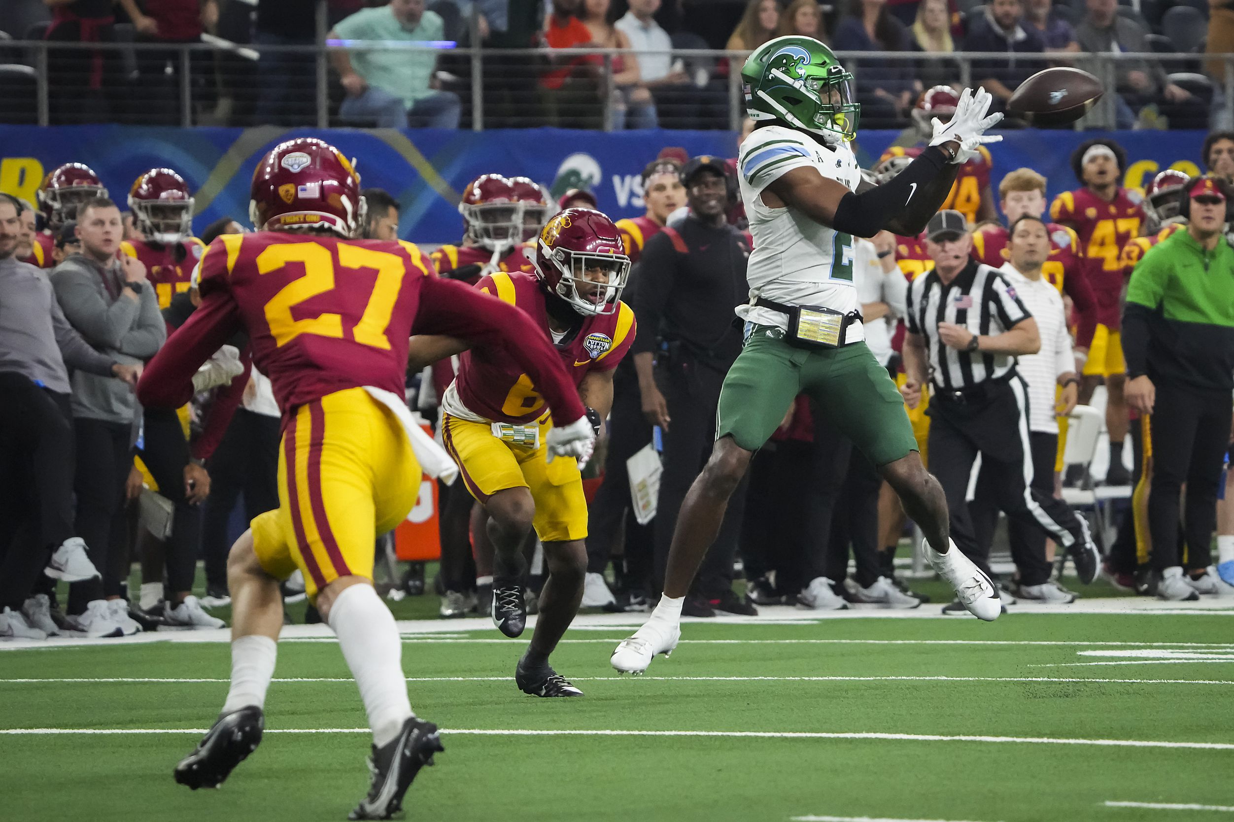Tulane wide receiver Duece Watts (2) catches a 26-yard pass to the USC six-yard-line setting...