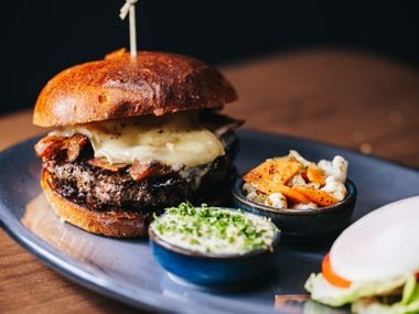 Ounce, a restaurant in downtown Dallas' AT&T Discovery District, will sell a burger created by chef Brian Zenner. Ounce is expected to open Dec. 16, 2020.
