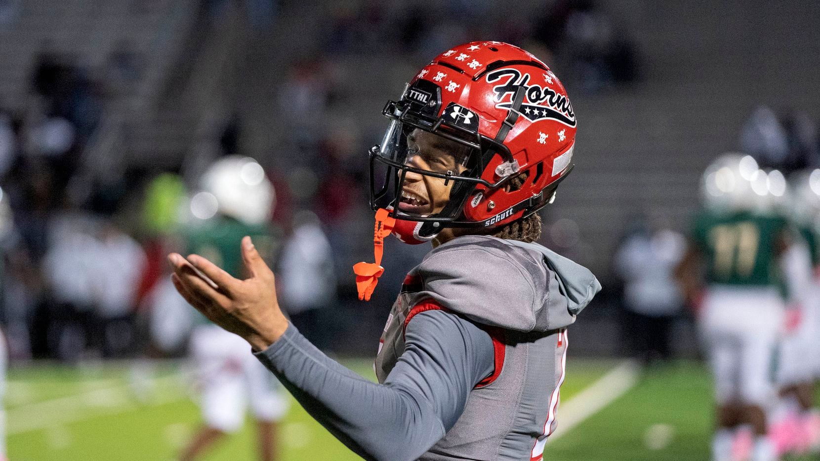 Cedar Hill senior cornerback Jalon Peoples (2) smiles at the DeSoto bench during the second...