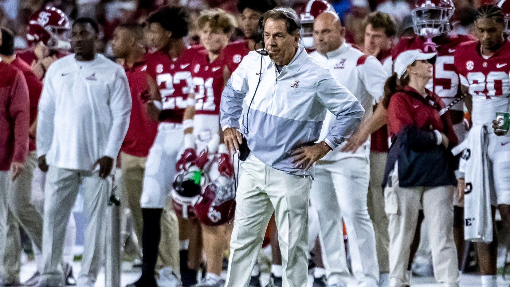 Alabama coach Nick Saban stands near the sideline during the first half of the team's NCAA...