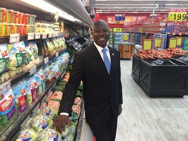 Former Dallas City Council member Tennell Atkins stands in the new Save-A-Lot grocery store...