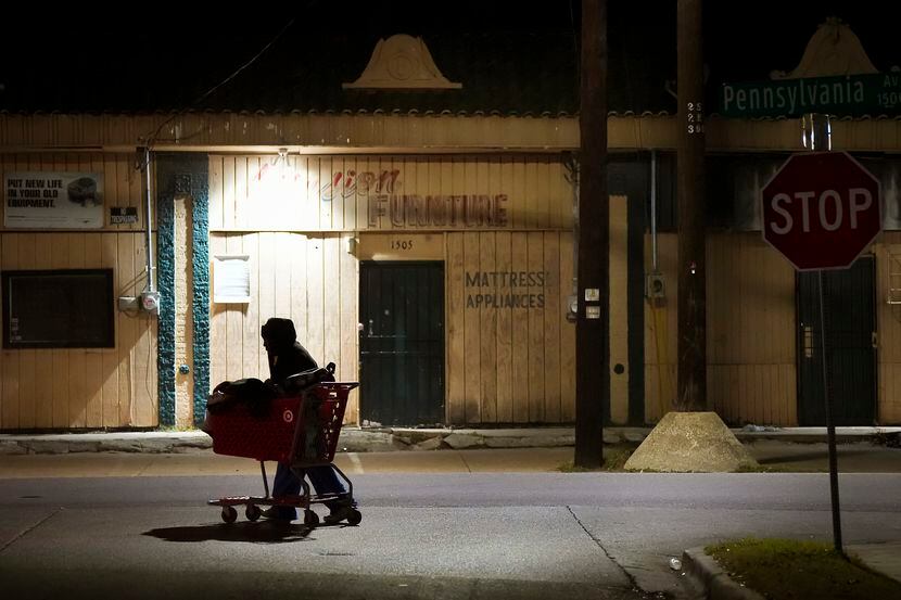 Earl, a man experiencing homelessness, pushed a cart in the 1500 block of Pennsylvania...
