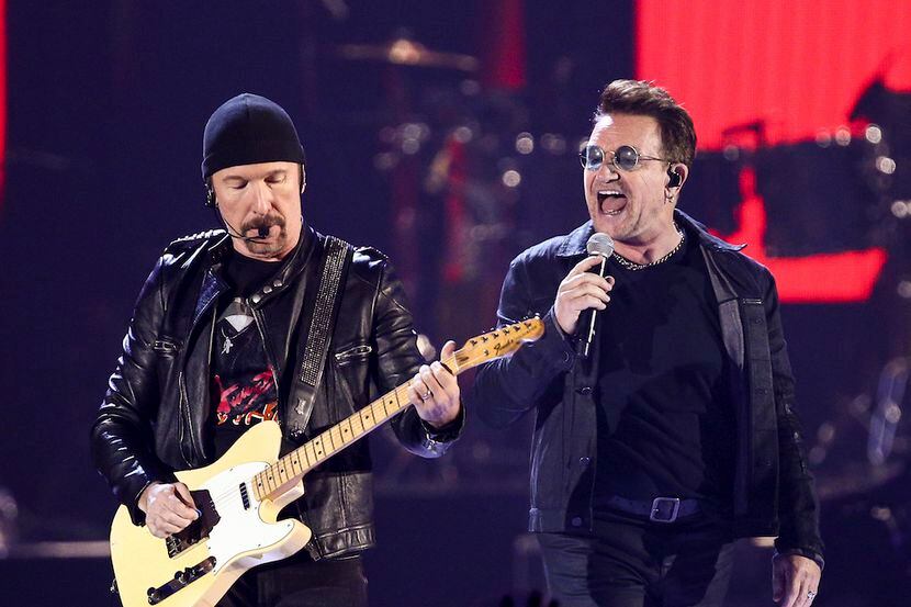 In this Sept. 23, 2016, file photo, The Edge, from left, Bono and Adam Clayton of the music...