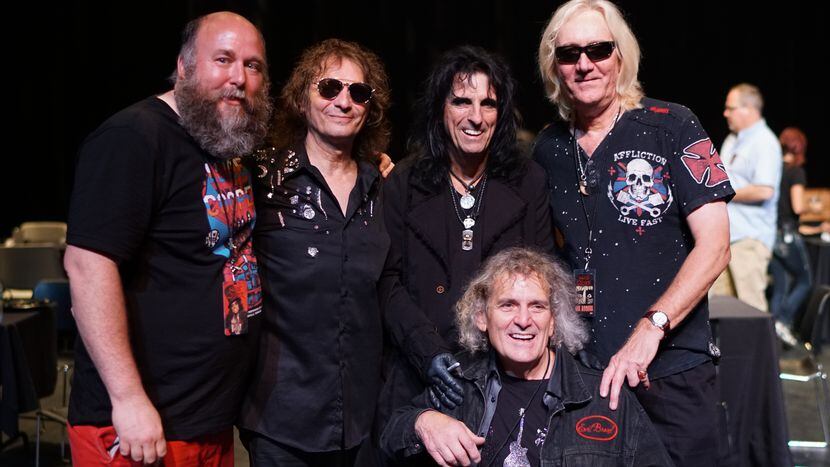 Good Records owner Chris Penn (left) got to meet his musical heroes from the Alice Cooper...
