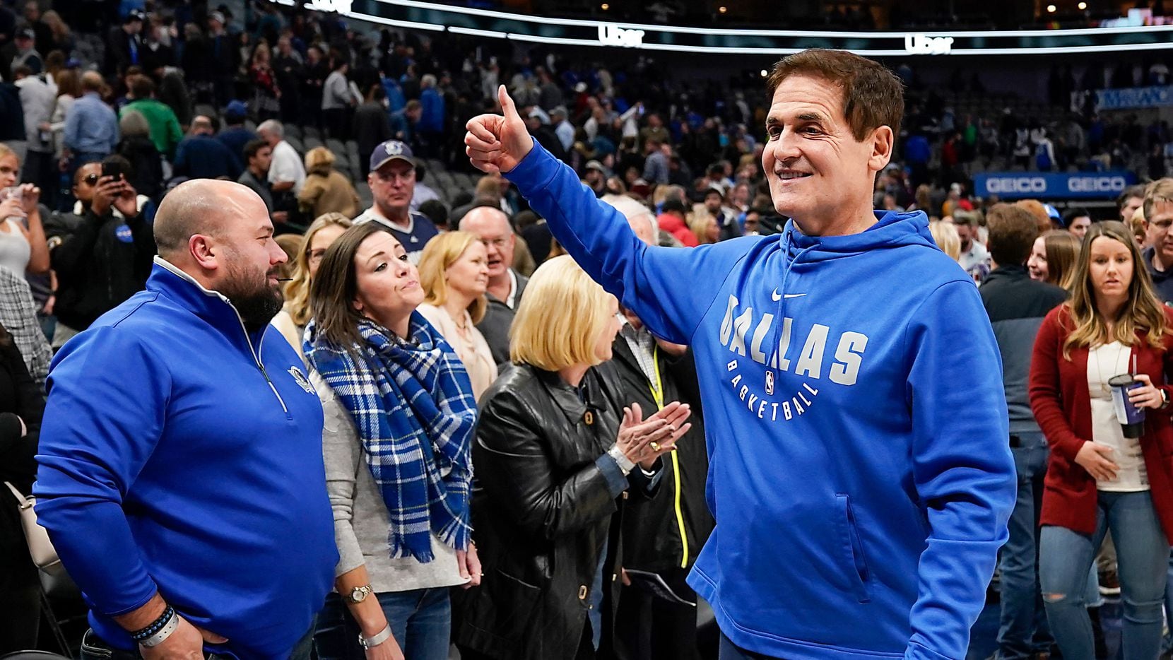 Dallas Mavericks owner Mark Cuban gives a thumbs up to the crowd as he leaves the court after a victory over the Toronto Raptors in an NBA basketball game at American Airlines Center on Saturday, Nov. 16, 2019, in Dallas.