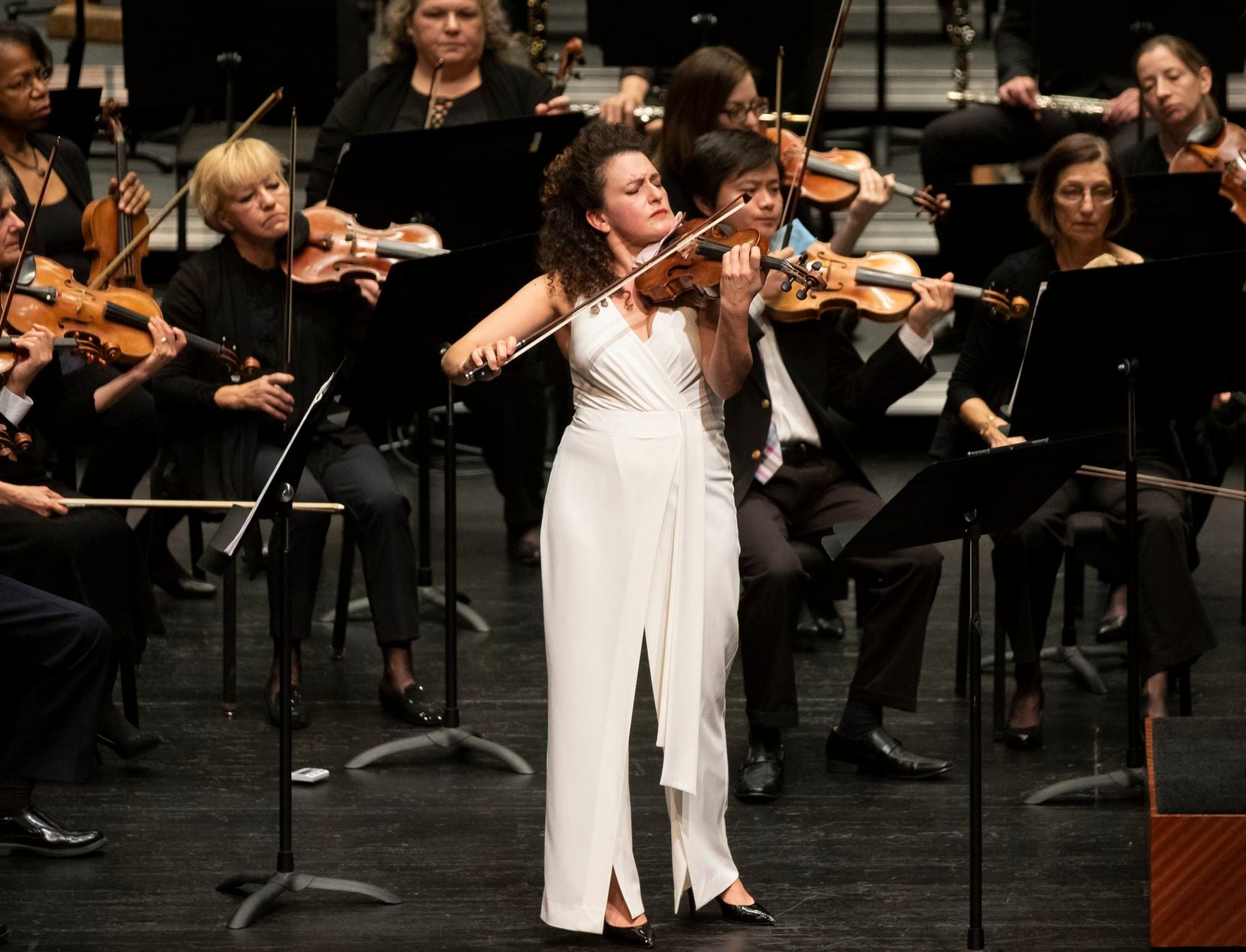 Liza Ferschtman (center) performs Allegro of Samuel Barber's Violin Concerto with the Fort...