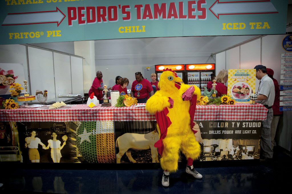 A man in a chicken suit dances as competitors prepare their entries during the 2016 Big Tex Choice Awards Sunday, August 28, 2016 at Fair Park in Dallas. The annual event, held ahead of the State Fair of Texas, recognizes the best fried foods entered into consideration for sale at the fair. (G.J. McCarthy/The Dallas Morning News)