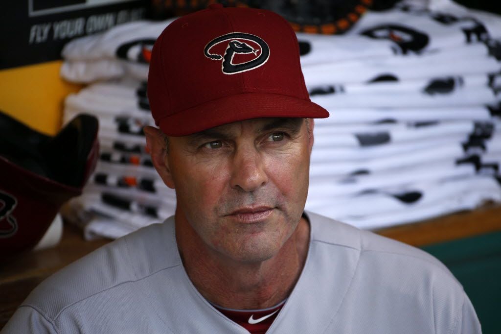 IFLE - In this July 3, 2014 file photo, then-Arizona Diamondbacks manager Kirk Gibson sits in the dugout before a baseball game against the Pittsburgh Pirates in Pittsburgh. (AP Photo/Gene J. Puskar)