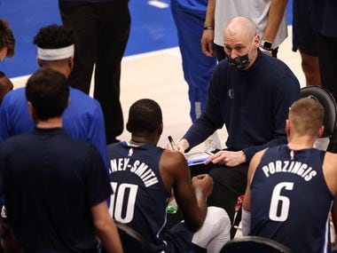 Dallas Mavericks head coach Rick Carlisle talks to the team during a timeout in a game against the Phoenix Suns during the fourth quarter of play at American Airlines Center on Monday, February 1, 2021in Dallas.