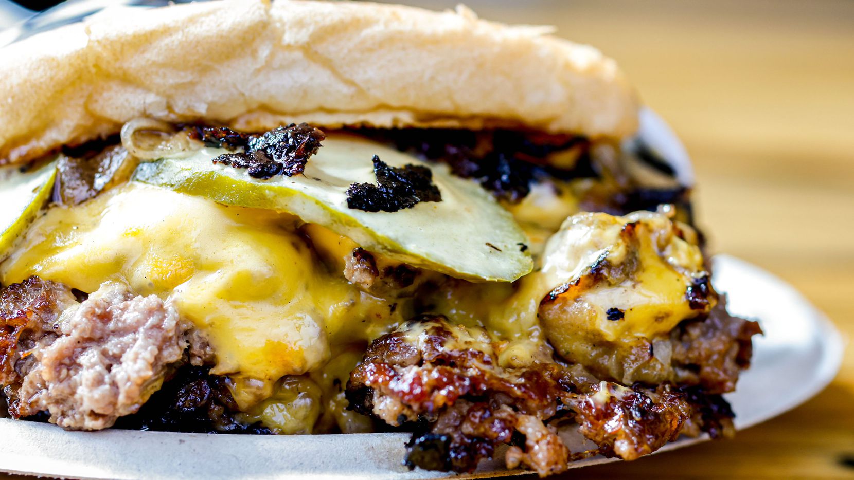 Burger Schmurger's flagship burger is the Schmurger, a double patty, double cheese delight...