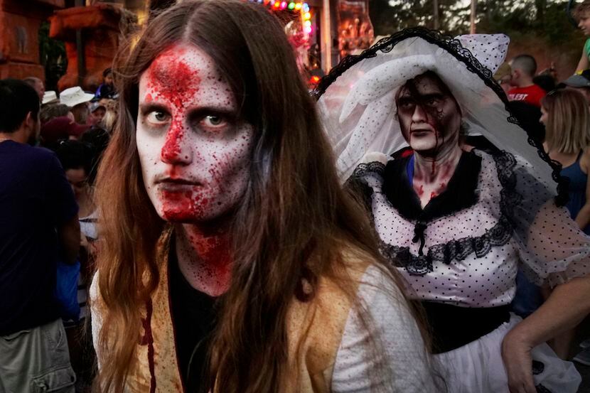 Six Flags Over Texas' Fright Fest includes haunted houses and Halloween-inspired entertainment.