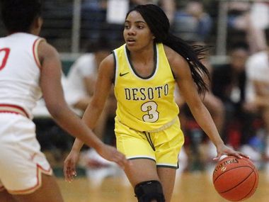 DeSoto High School guard Kayla Glover (3) looks to make a pass during the second half as...