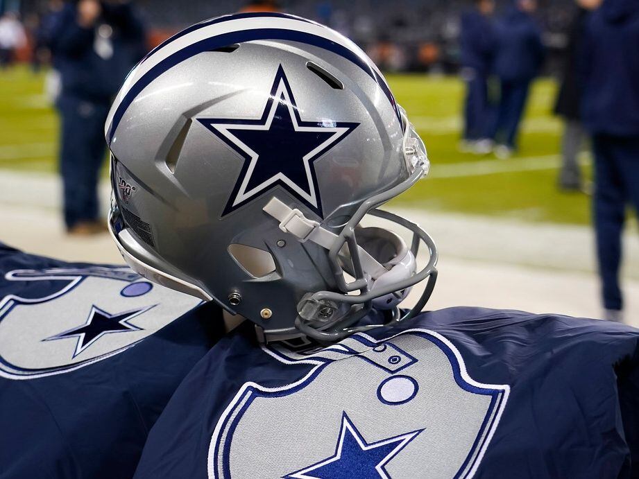 A Dallas Cowboys helmet on the bench before an NFL football game against the Chicago Bears...