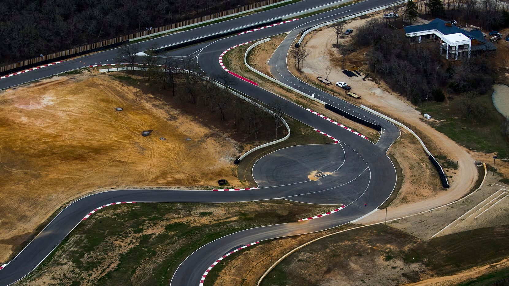 The site of the Toyota executive retreat in Denton County  includes a racetrack and...